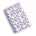 Libreta arillada Flor de Jacaranda de tapa dura mate con arillo metálico, vista frontal