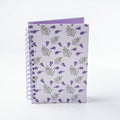 Libreta arillada Flor de Jacaranda media carta con tapa dura ilustrada y arillo metálico