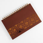 Libreta arillada Tejido Dorado de tapa dura mate con arillo metálico, vista frontal