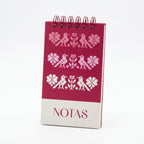 Libreta de notas Tejido Rosa vertical con arillo metálico superior, tapa dura mate y elástico